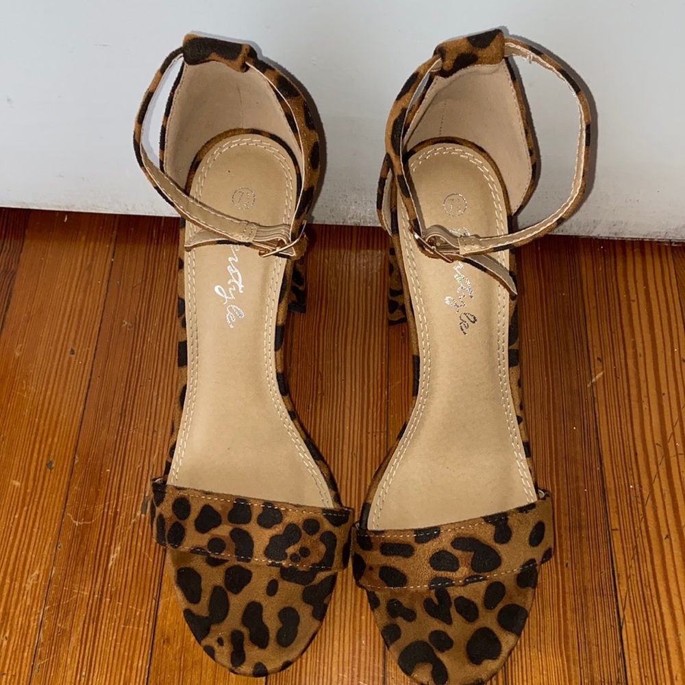 Open toed cheetah print block heels